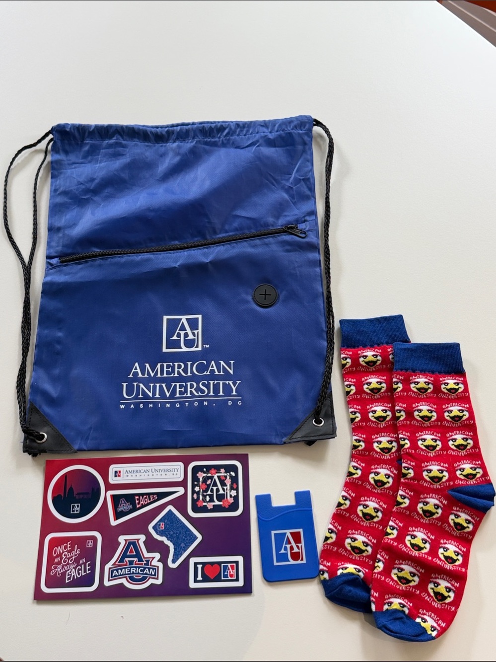American University Swag: Drawstring Backpack, Stickers,  Socks and more